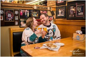 engagement session ideas for Minnesota Wild Fans cheers to the couple