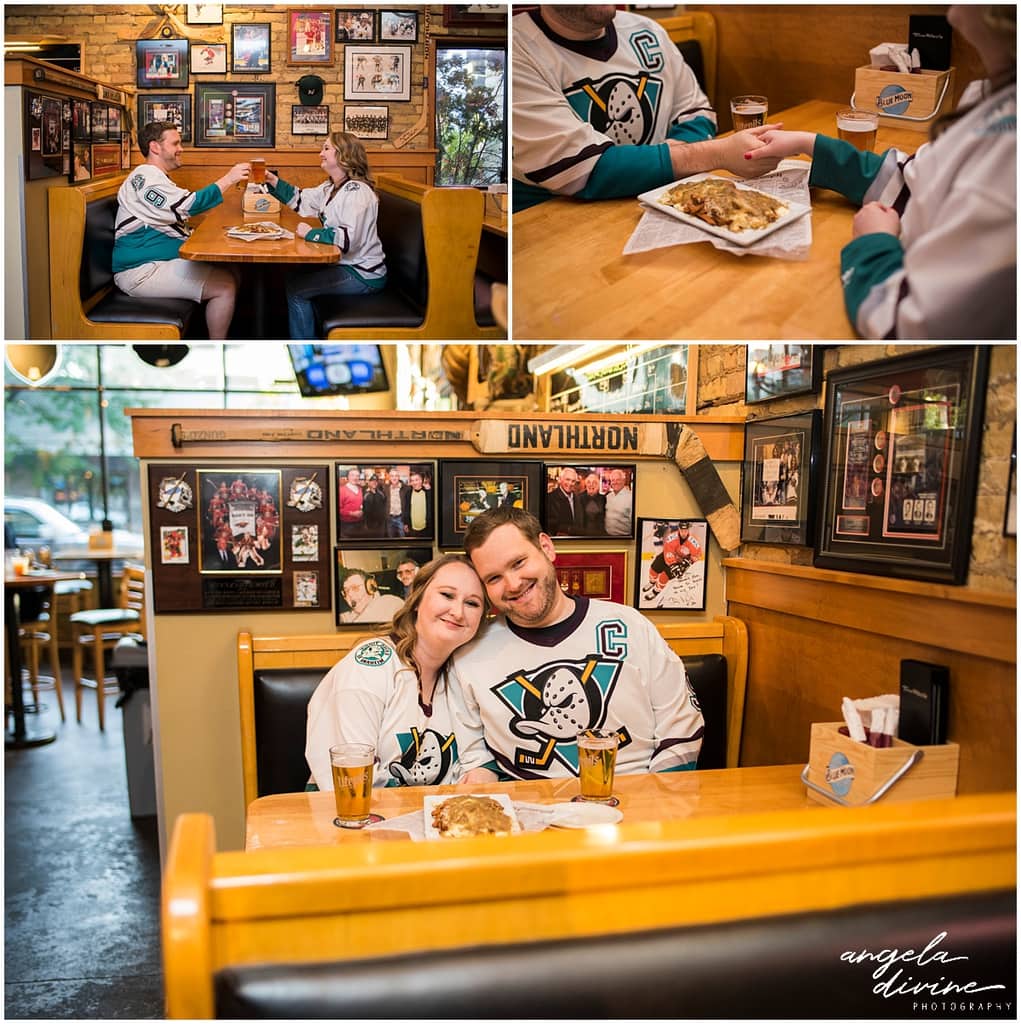 engagement session ideas for Minnesota Wild Fans sharing beer and poutine