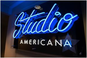 Minneapolis podcast photography Studio Americana sign