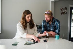Minnesota personal brand photography couple picking paint samples