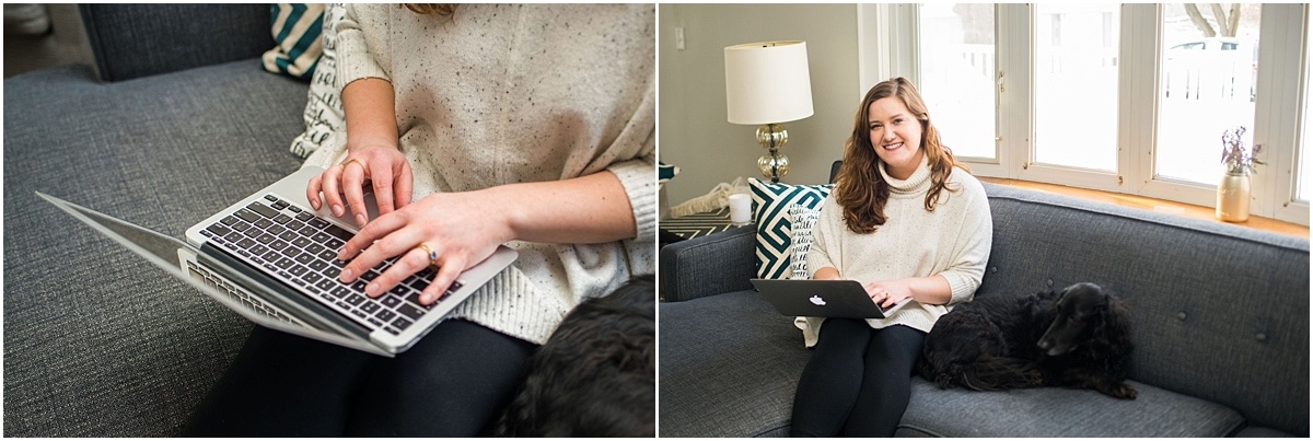 woman working on computer in living room with dog