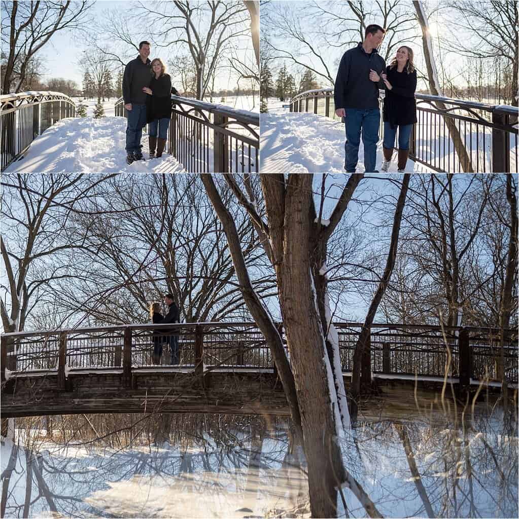 engaged couple on snow covered bridge