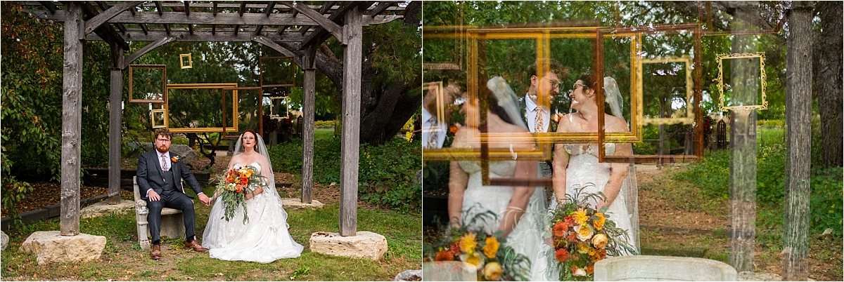 bride and groom pose with picture frames