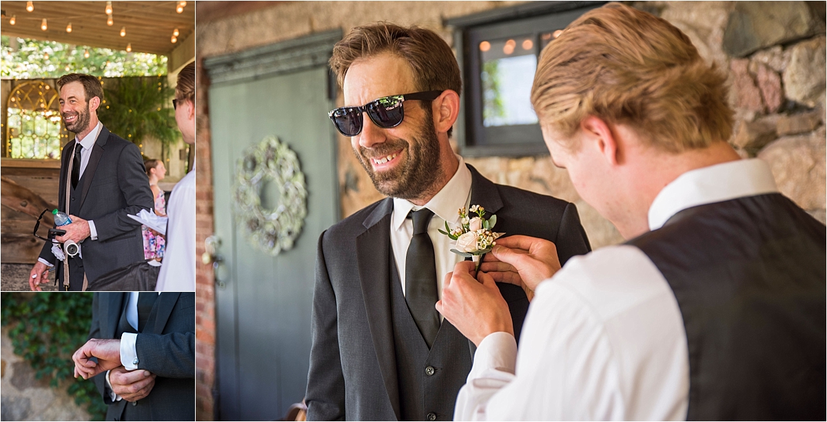 best man pinning boutonniere on groom