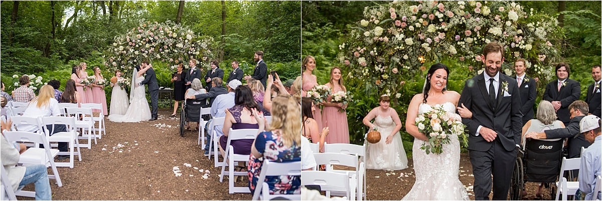 bride and groom kiss and walk down the aisle