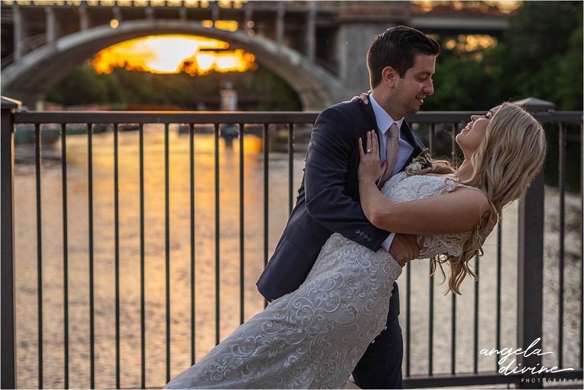 Minneapolis Event Centers Wedding couple on bridge at sunset