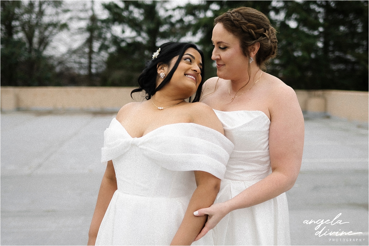 Minneapolis Marriott Southwest brides pose gazing at each other